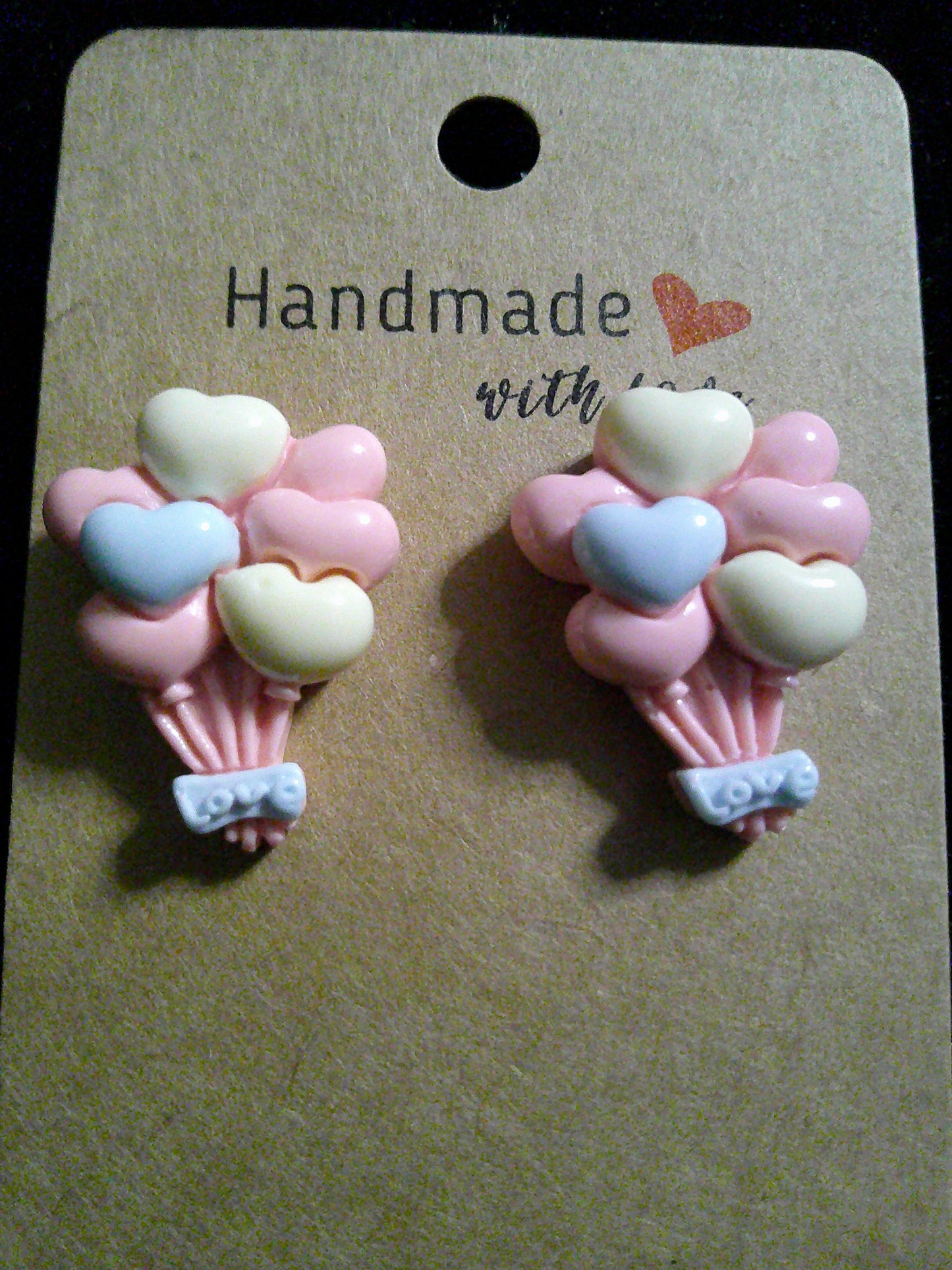 Pink/yellow/blue LOVE balloons