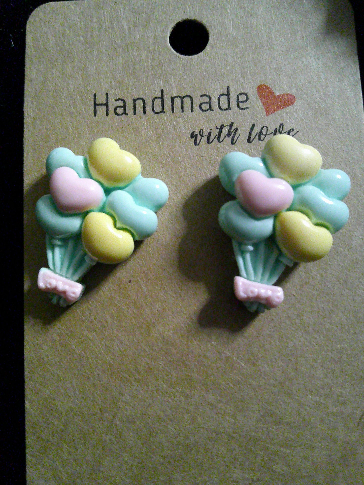 Yellow/pink/green LOVE balloons