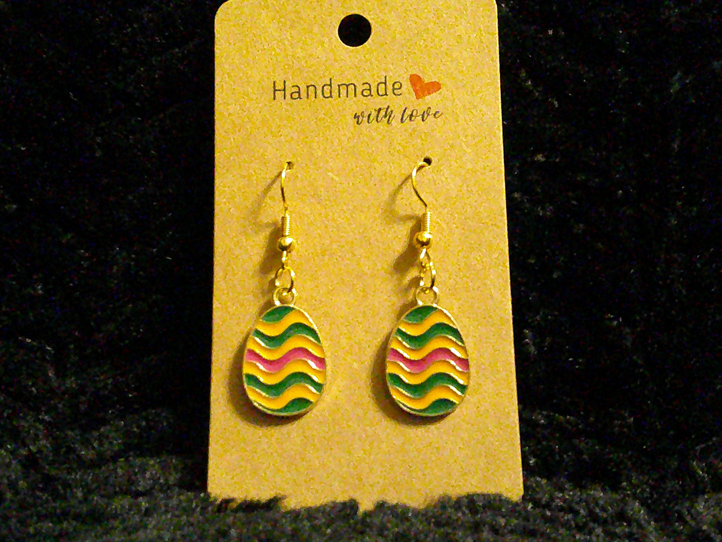 Orange egg with green & hot pink stripes