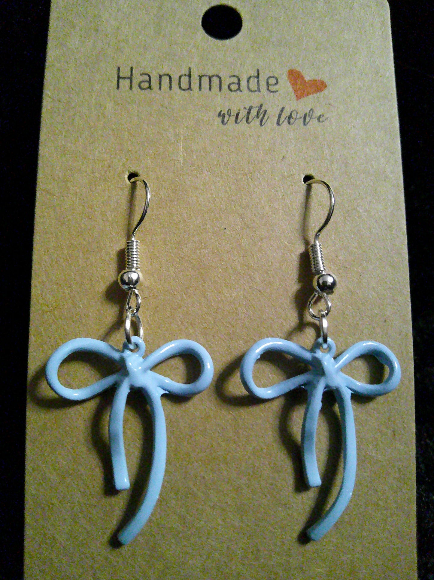 Light blue bow on silver