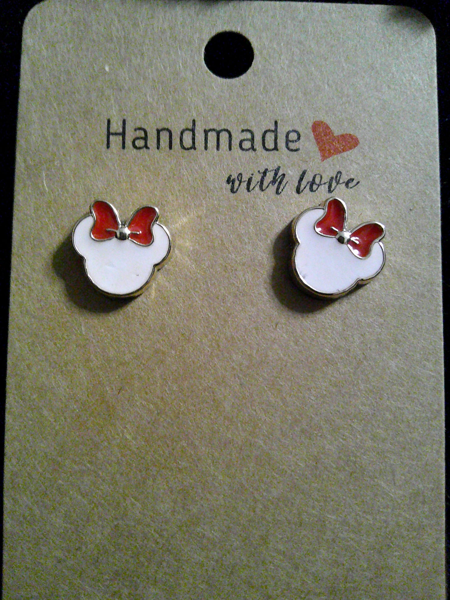 White mouse ears with red bow