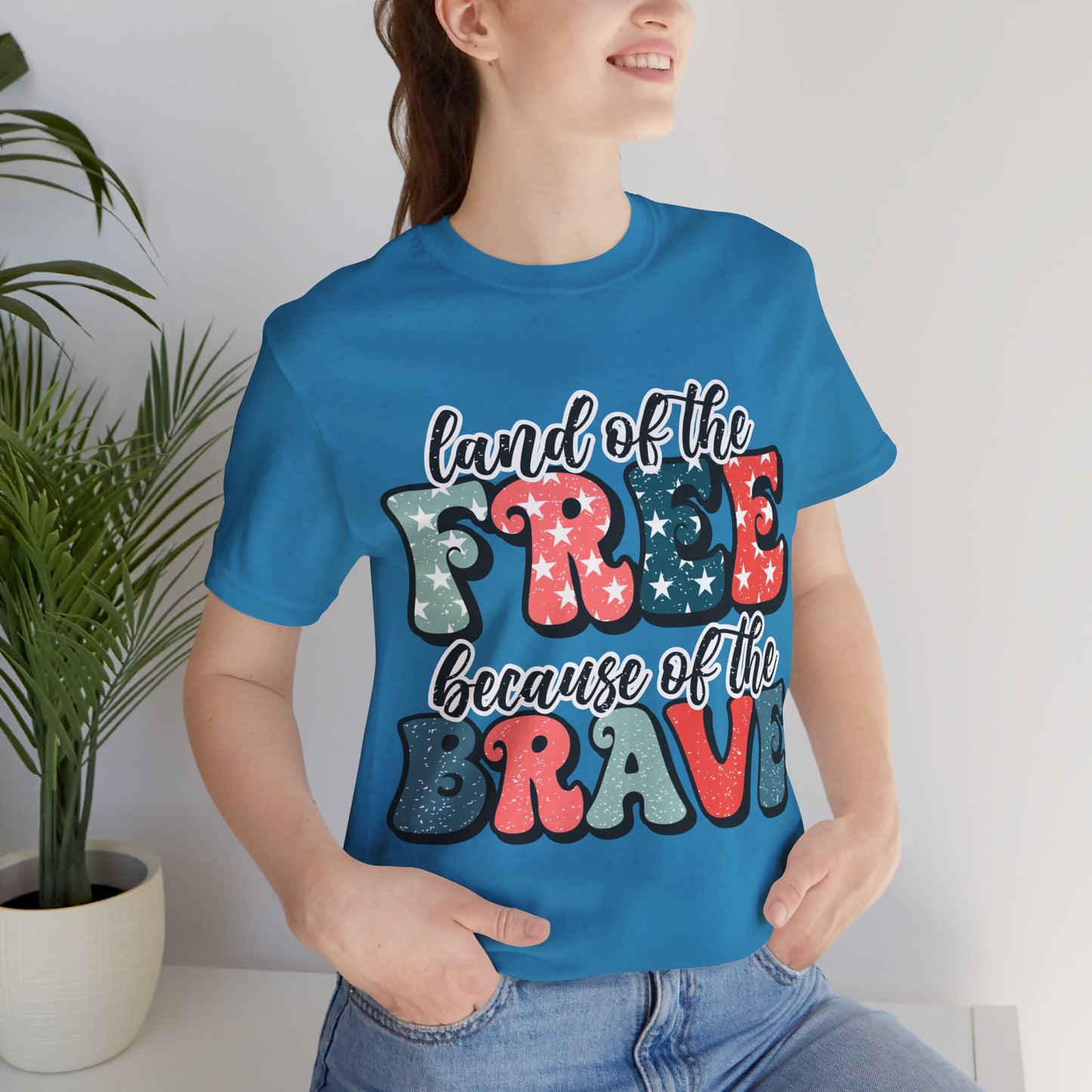 Land of the Free because of the Brave Jersey Short Sleeve Tee
