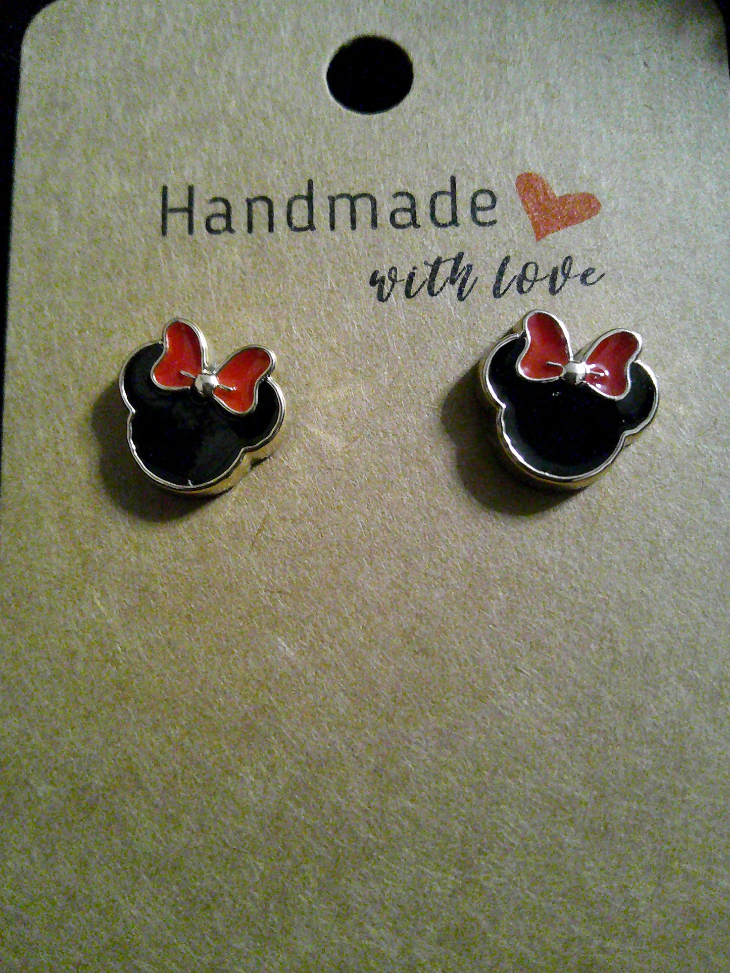 Black mouse ears with red bow