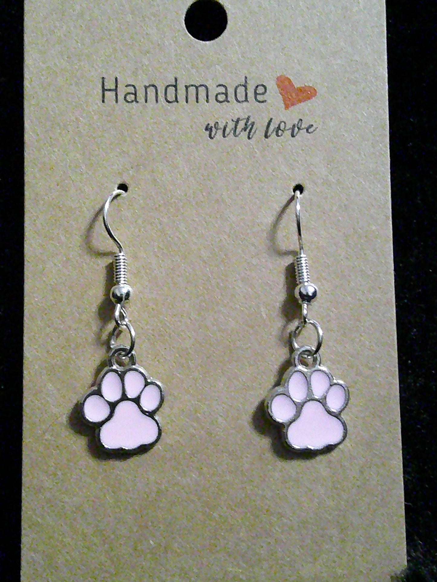 small light pink paw on silver
