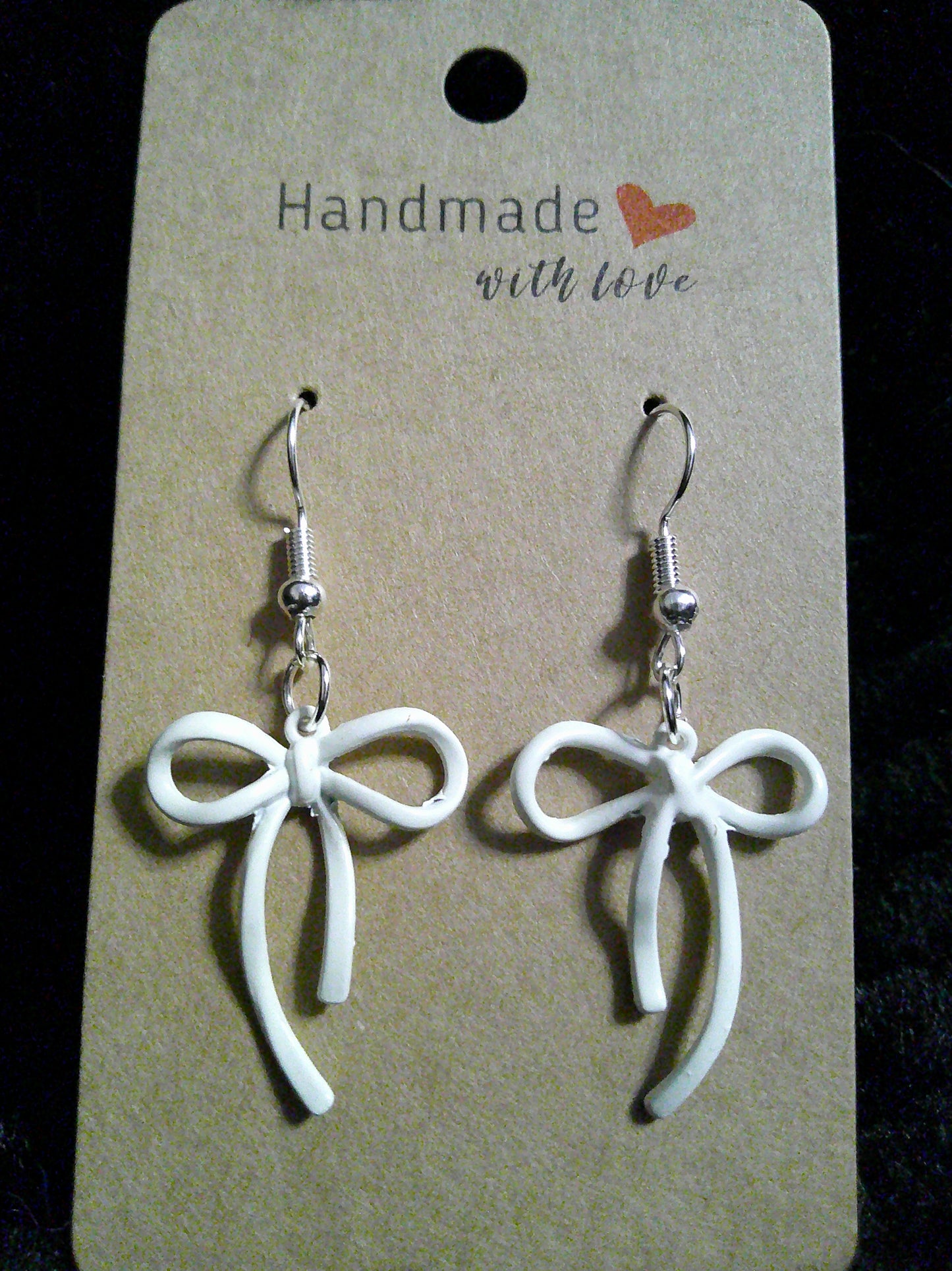 White bow on silver