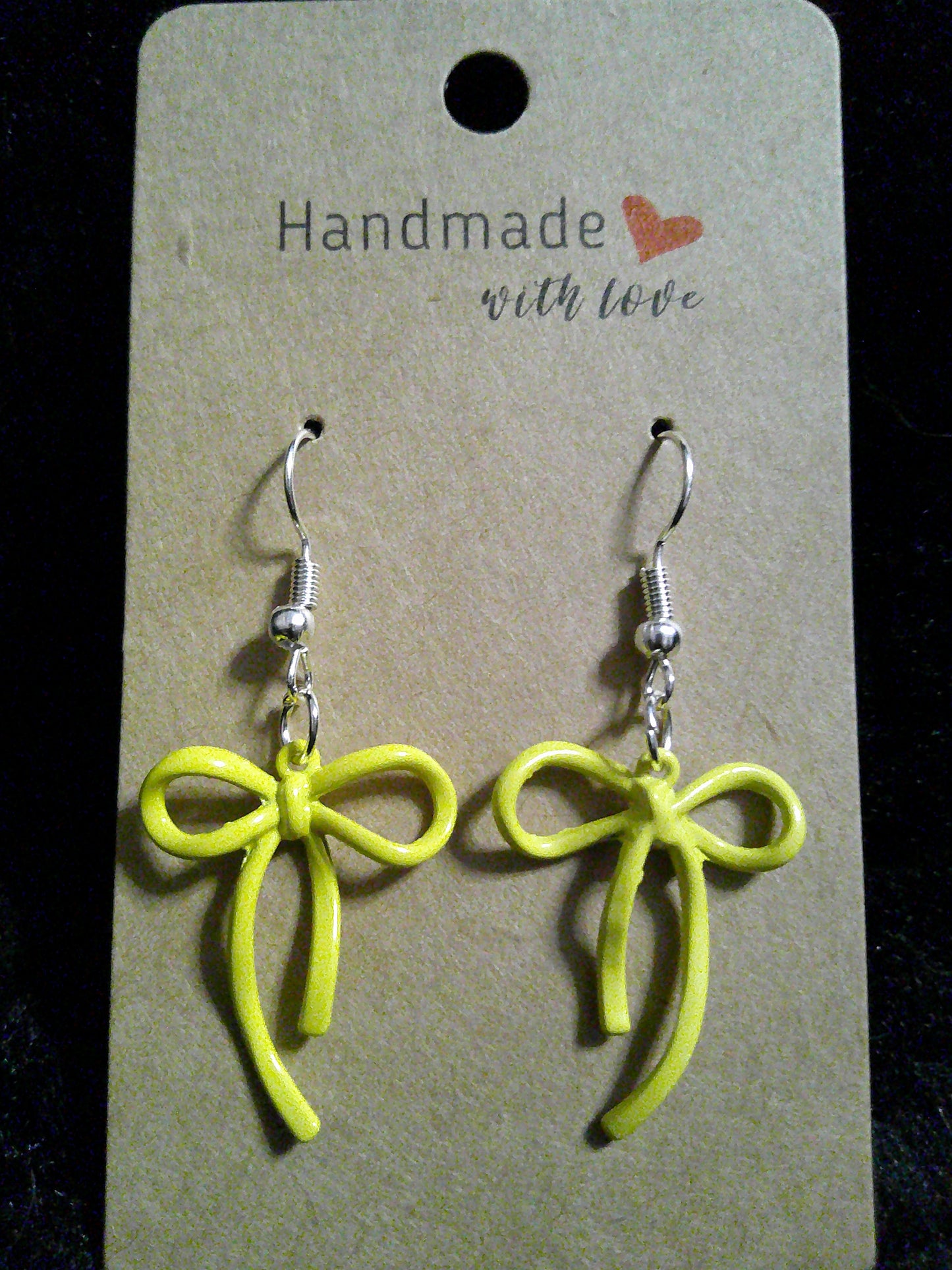 Yellow bow on silver